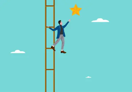 Cartoon image of a man high on a ladder among the clouds, reaching out to touch a star. The ladder is wood-coloured, the man is wearing grey trousers, brown shoes, a black top and blue blazer. The sky is pale blue.