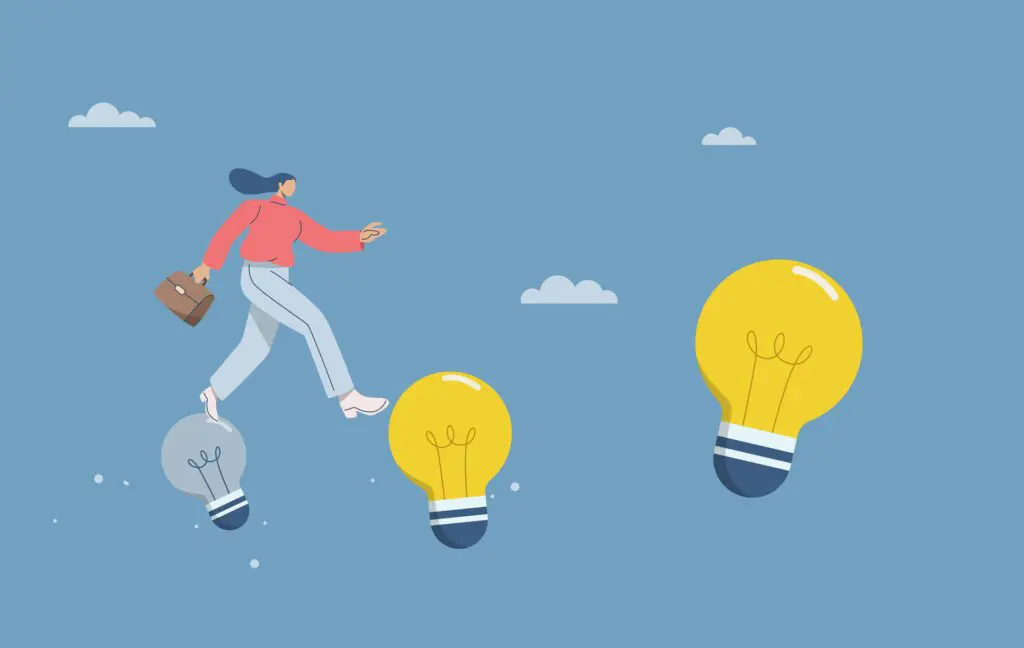 Cartoon of woman walking across a blue sky by stepping on three floating lightbulbs. Two bulbs are yellow and one is grey. Moving from the left, she's currently stepping from the grey one, which is smaller, onto a larger yellow one in the middle, and there's an even larger yellow one on the right, which would be her next step.