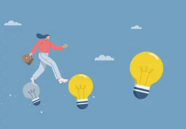 Cartoon of woman walking across a blue sky by stepping on three floating lightbulbs. Two bulbs are yellow and one is grey. Moving from the left, she's currently stepping from the grey one, which is smaller, onto a larger yellow one in the middle, and there's an even larger yellow one on the right, which would be her next step.
