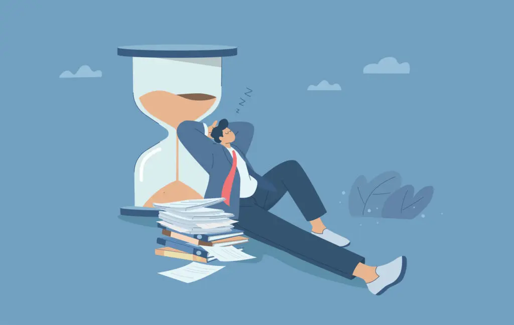 Illustration of slow down. Man in suit lying back against a giant hourglass taking a nap, with his papers and folders in a pile beside him. Set against a blue sky.
