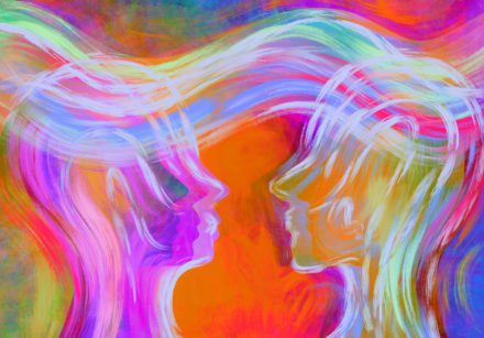 image showing telepathy between two people as brightly coloured waves