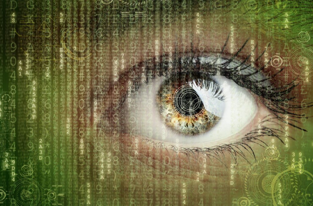 Woman's eye with digital image overlain over