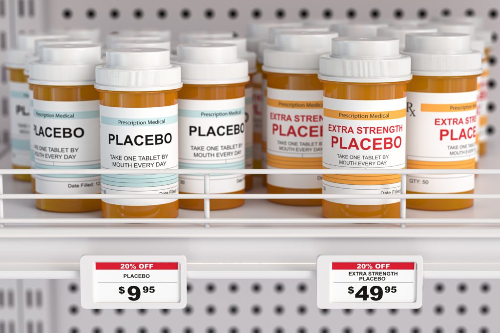 Bottles with some labels saying placebo and other labels saying extra strength placebo.