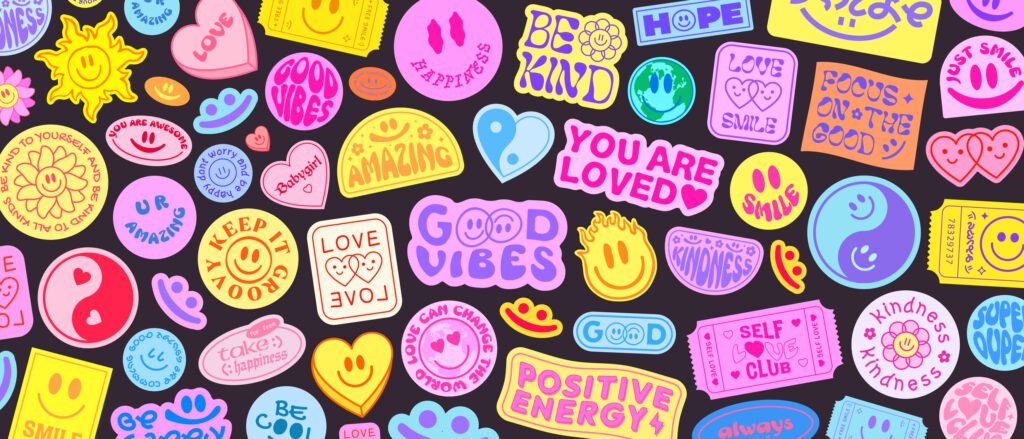 Cool, groovy colourful stickers on a black background. You are loved, good vibes, positive energy, you are amazing, kindness, and others of similar sentiment.